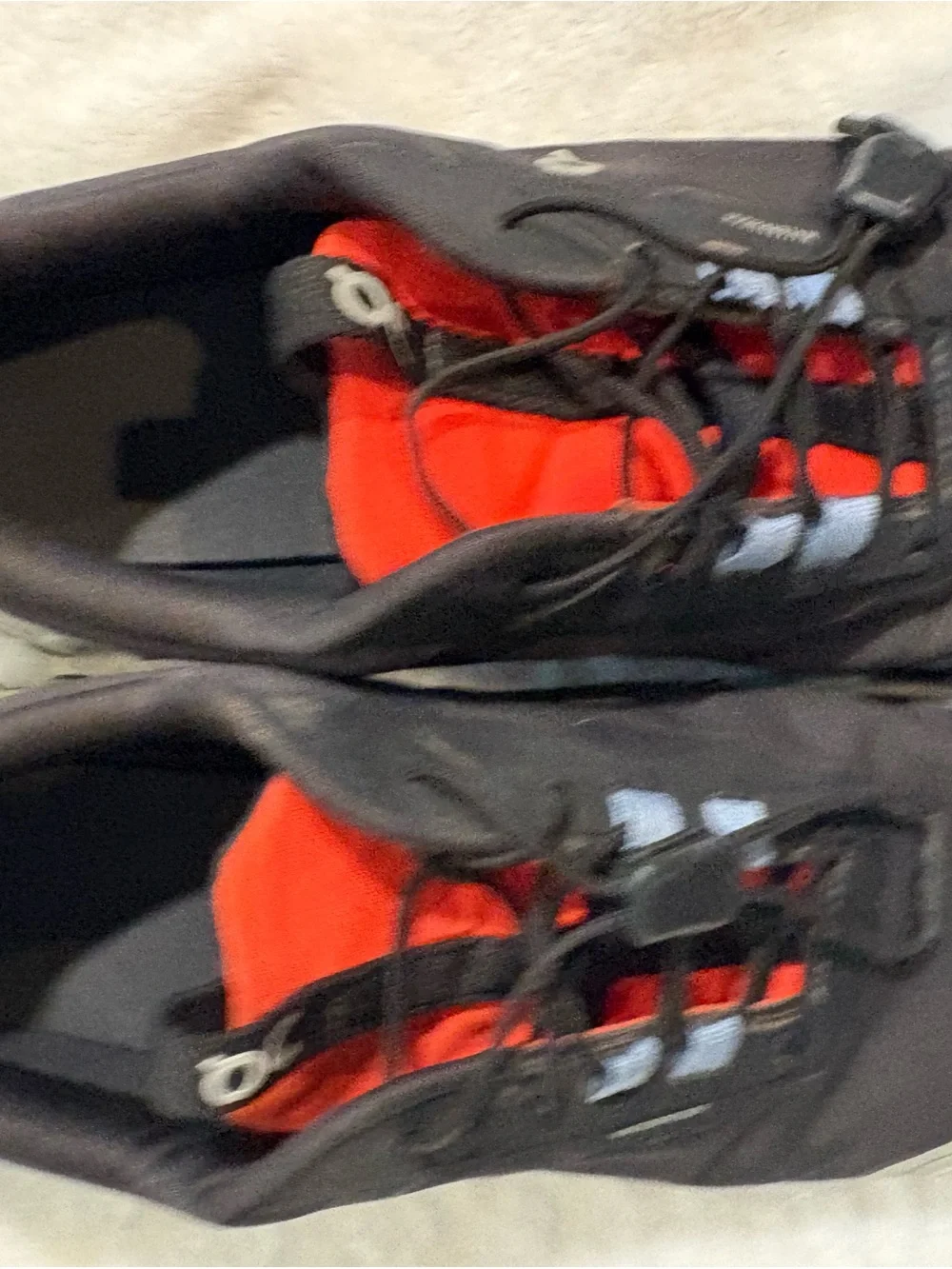 On Running Men's Trail Sneakers in Black, Gray and Red Accent